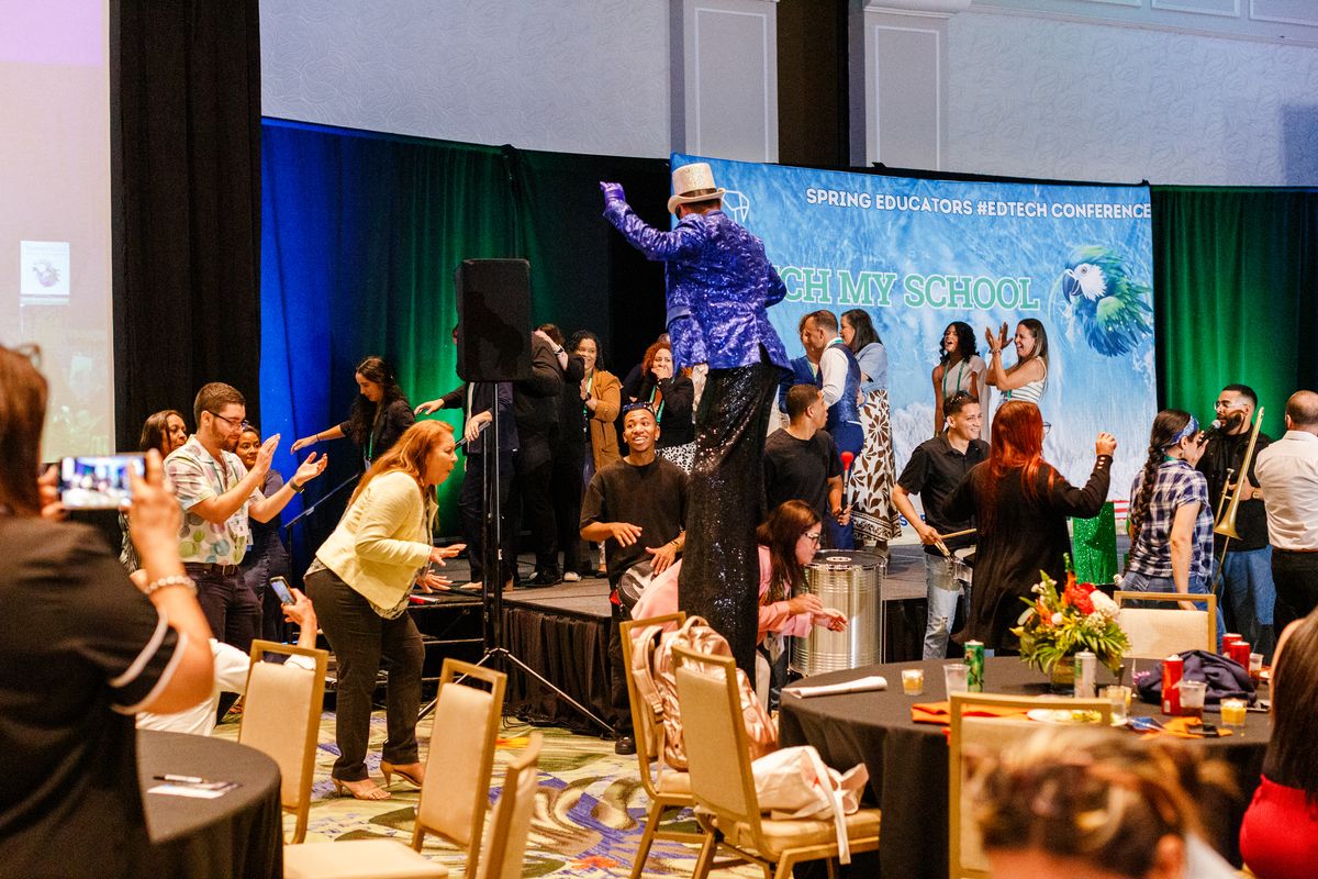 Stilt walker and live music turning the ballroom into a party