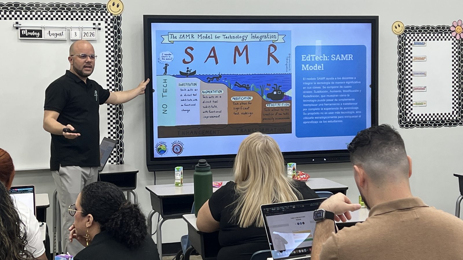 Teachers in a TMS professional development session
