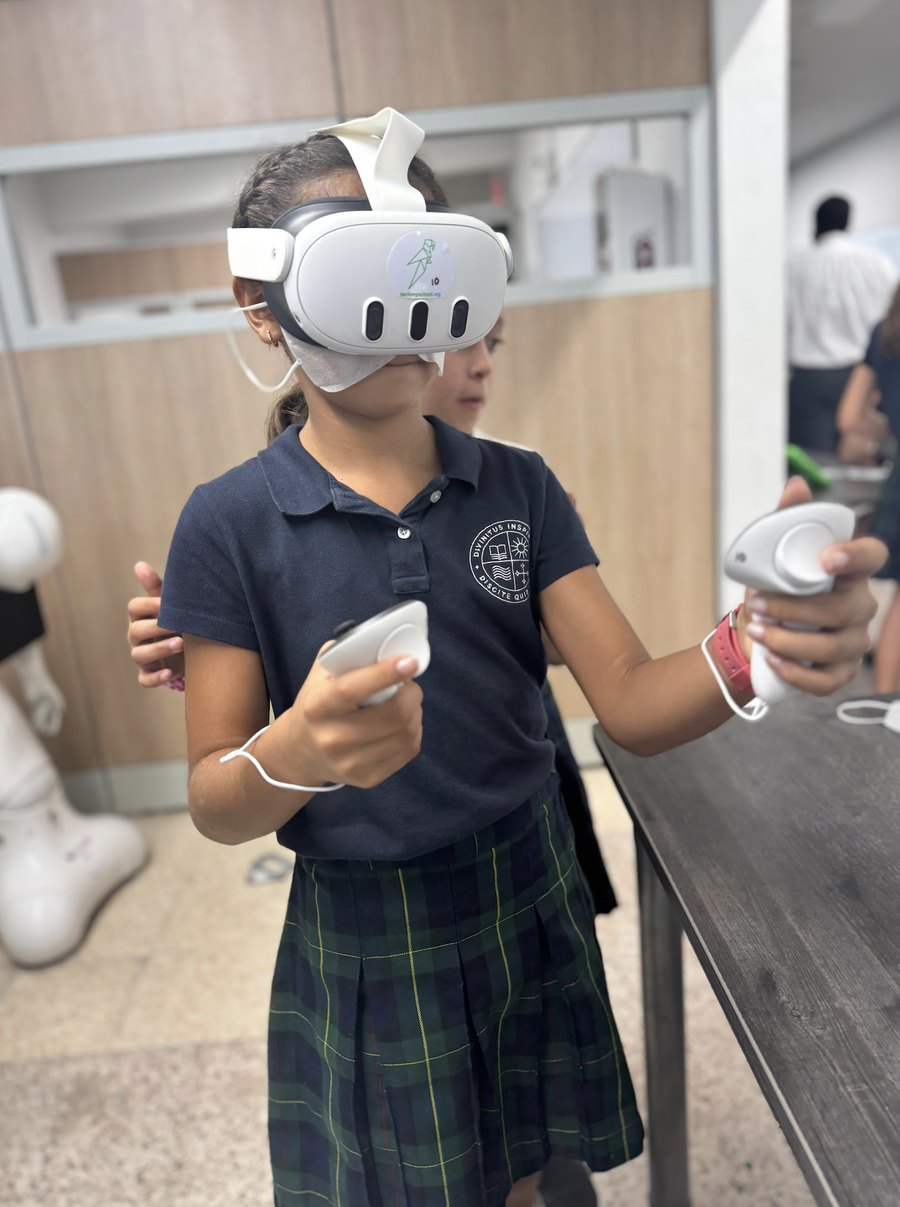 A student explores virtual reality during a Tech My School class